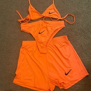Orange and black Nike 3 piece bikini includes swim shorts